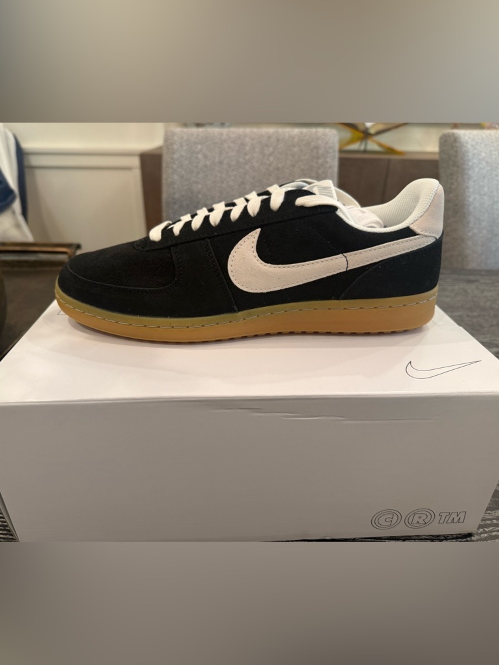 Nike Black Suede Low-Top Sneakers with White Swoosh and Gum Sole